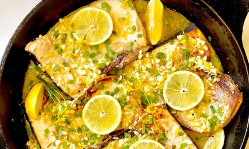 Seared Swordfish Topped With A Savory Lemon And Garlic Sauce