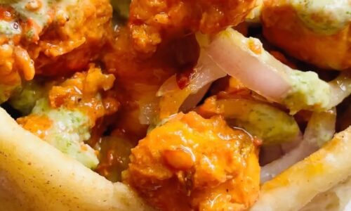 Achari Chicken Roll Paratha