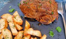 Lamb Roast Served With Creamy Vegetables And Potato Wedges