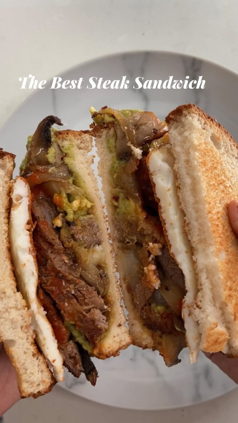 Steak Sandwich With Smashed Avocado, Caramelised Onions And Mushrooms